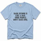 chambray crewneck t-shirt with a black printed text graphic on the chest that reads 'DARK HUMOR IS LIKE A DAD, SOME PEOPLE DON'T HAVE ONE.'.