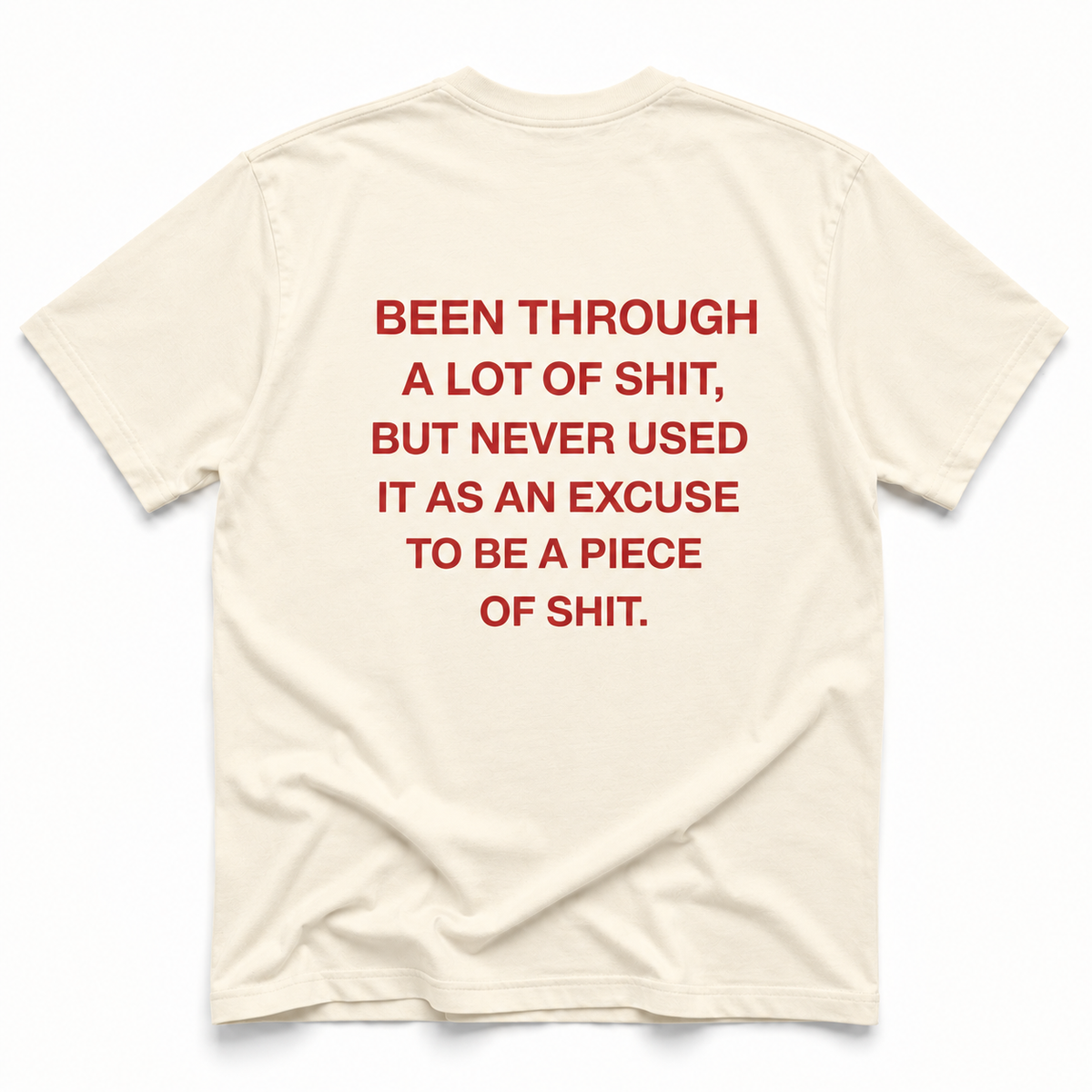 ivory short-sleeve t-shirt with bold red text printed on the back, laid flat against a clean white background.
