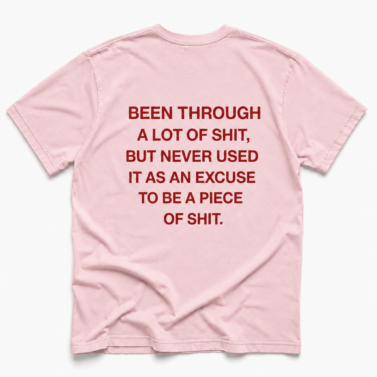 blossom short-sleeve t-shirt with bold red text printed on the back, laid flat against a clean white background.
