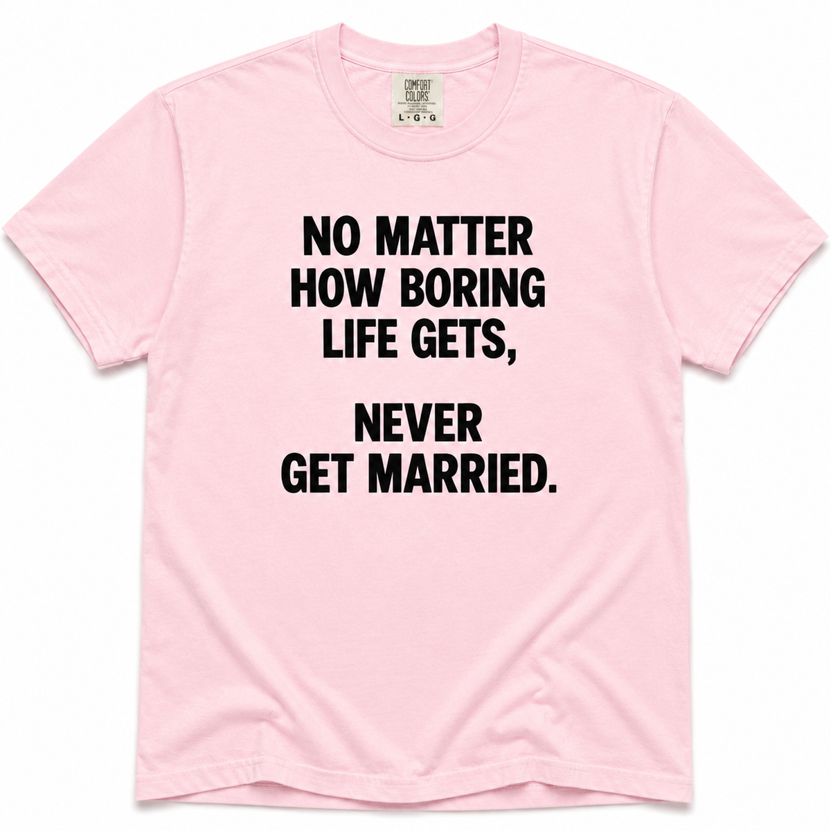 Blossom short-sleeve crewneck T-shirt with bold black “No Matter How Boring Life Gets, Never Get Married” text printed on the front.