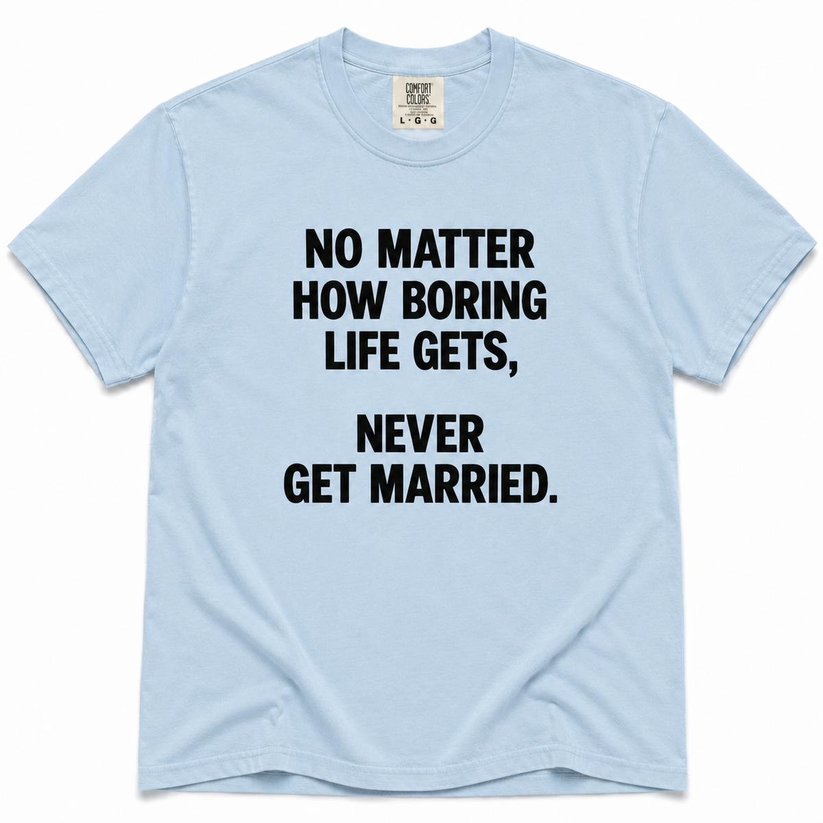 Chambray short-sleeve crewneck T-shirt with bold black “No Matter How Boring Life Gets, Never Get Married” text printed on the front.