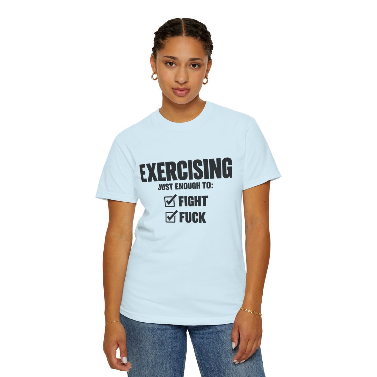 Woman modeling a Chambray crewneck T-shirt with black “Exercising Just Enough To: Fight, Fuck” graphic and checked boxes on the front, paired with blue jeans on a white background.